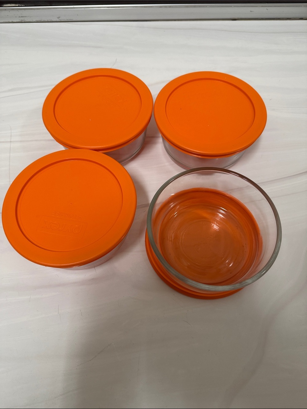 Set of 4 Round Glass Storage Bowls with Bright Orange Lids